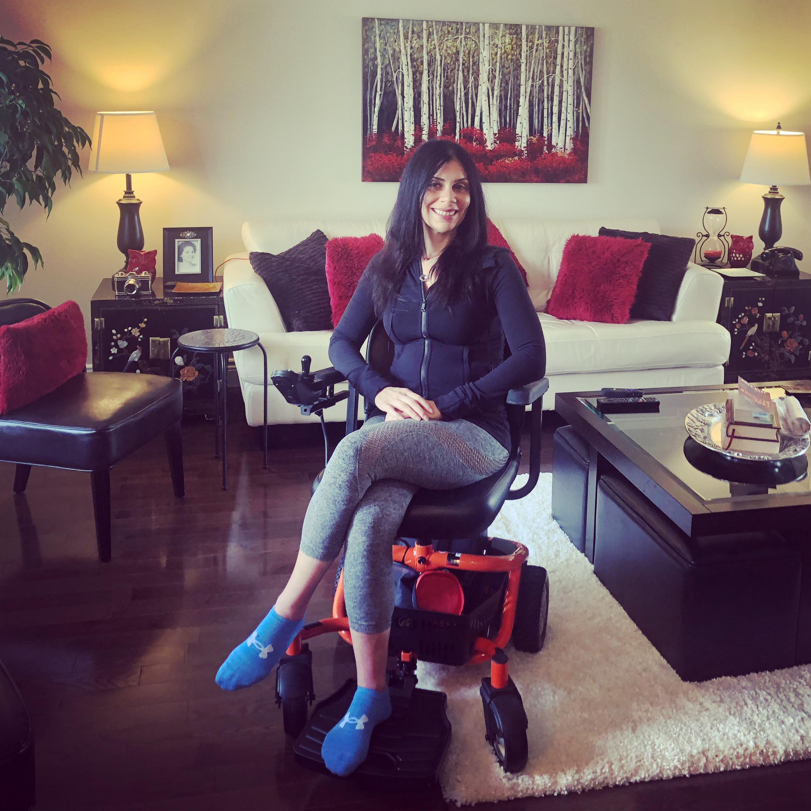 Anna In Her Golden LiteRider Envy Power Wheelchair