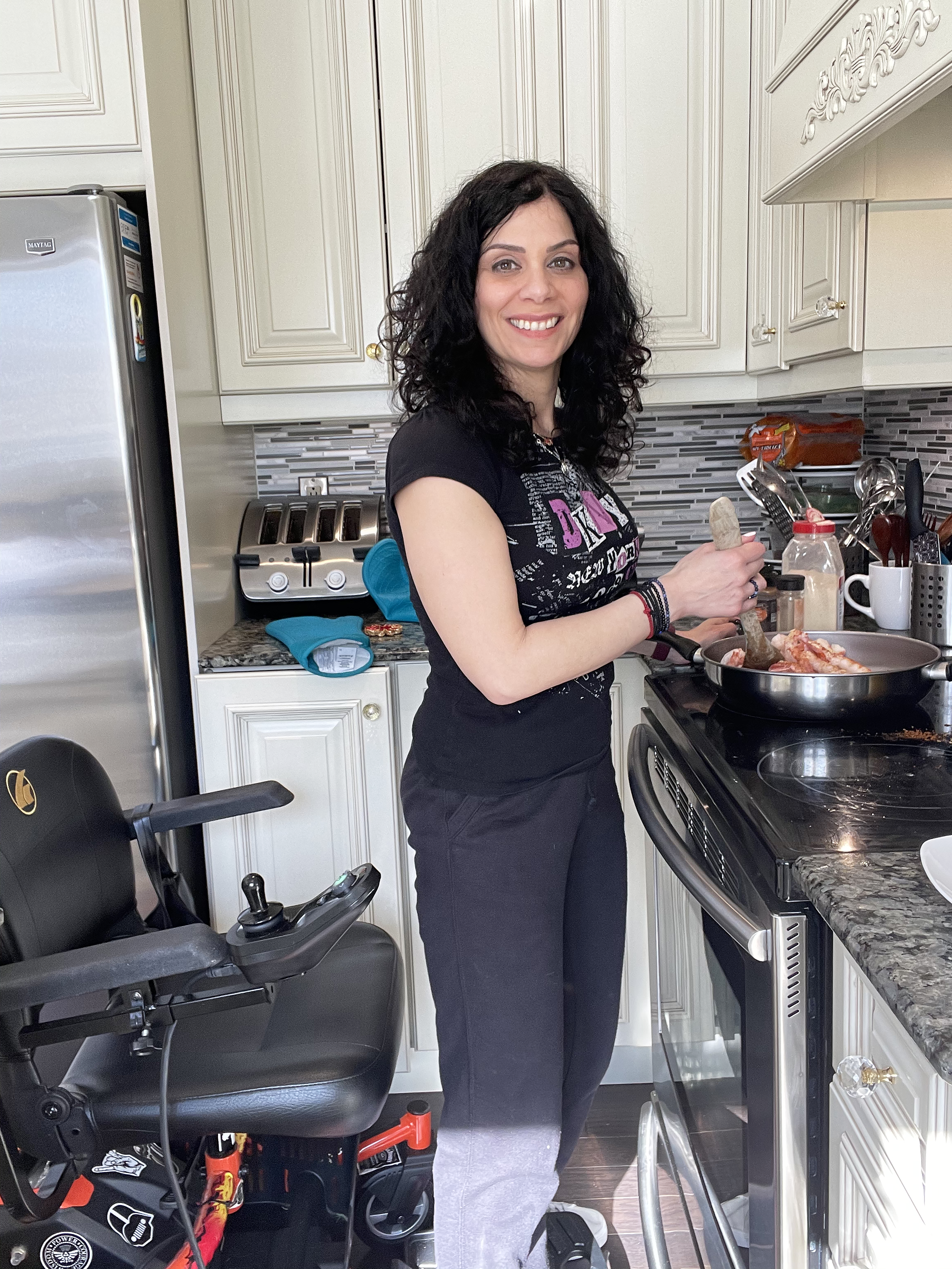 Anna Giannakouros Cooking with support from Golden Technologies LiteRider Envy Power Wheelchair